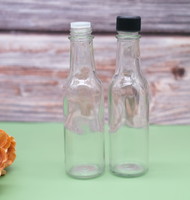 Bouteille de stockage en verre transparent HCP 150 ml (5 oz) avec couvercle en plastique pour sauces, ketchup, jus - Vente en gros