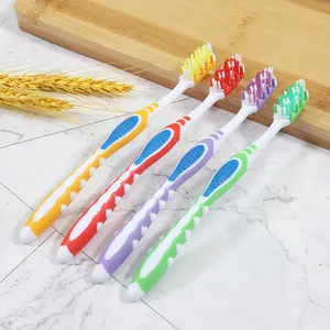 Wholesale adult teeth massage bristles plastic manual toothbrush with logo