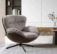 Fauteuil inclinable à bascule de luxe moderne nordique avec structure en fer, revêtement en cuir synthétique souple, fonction d'inclinaison pour la maison, le bureau et l'hôtel