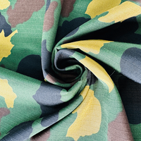 Tissu camouflage imprimé tissé en mélange de polyester 65% et de coton 35% de conception classique en camouflage forestier nigérian en gros