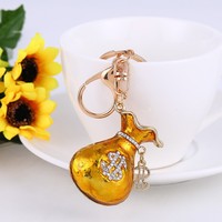 Porte-clés en alliage de zinc avec strass, style américain, motif sac porte-bonheur, pendentif de voiture, emballé individuellement, petit format