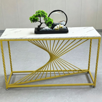 Console d'entrée en marbre doré de style nordique, soigneusement sélectionnée, légèrement luxueuse, minimaliste, avec base en fer forgé