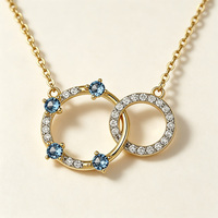 Collier pendentif YILUN en argent 925 plaqué or avec double cercle entrelacé pour femme, pierre CZ bleue, cadeau pour anniversaire