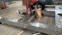 Banc de travail de soudage 3D haute précision avec grille perforée, taille personnalisable disponible pour la fabrication de structures en acier