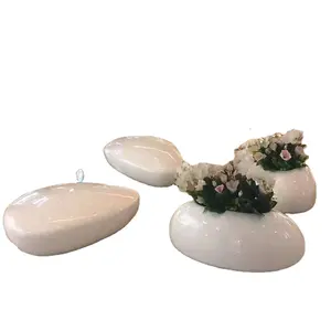 Factory Customized Fiberglass Pebble Flower Pot Seat Statue Sculpture for Mall Waiting Chair Lounge Chair