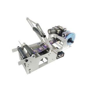 Machine d'étiquetage de table électrique manuelle pour bouteilles rondes et bouteilles de boissons - Product Image 1