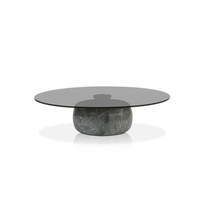 Table basse de luxe moderne en marbre, plateau circulaire en verre, base centrale en pierre de galet lisse