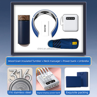 Coffret cadeau de vacances promotionnel cadeau personnalisé unique flacon sous vide de Noël + masseur de cou + batterie externe + impression de logo de parapluie