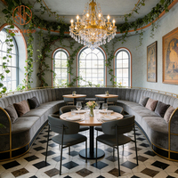 Ensemble de chaises de banquettes en cuir gris foncé de style européen avec structure métallique et table en bois pour café, restaurant, cafétéria, hôtel