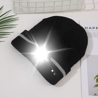 Gorro de gorro con luz LED portátil al por mayor, lámpara de gorro nueva con iluminación LED reflectante y gorros con modo de alarma intermitente