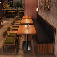 Chaises et tables de restaurant modernes en bois massif RuanMin avec banquettes en cuir PU pour hôtels, bars et restaurants haut de gamme