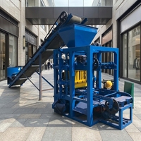 Machine à mouler les briques en béton manuelle Hong Fan QT4-26 économique, moulage par vibration, moteur fiable, boîte de vitesses haute efficacité