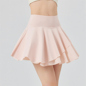 Jupe de tennis superposée à volants pour femme avec poches latérales et short intégré, anti-transparence, séchage rapide, pour le golf et le sport - Product Image 1