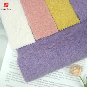 Изготовленная на заказ мягкая ткань для производства текстильного сырья 100 полиэфирная сплошная волнистая флисовая ткань для одеял и одежды