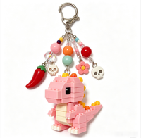 Llavero de PVC con cuentas de dinosaurio de bloques de construcción personalizados Weimei, colgante de cuentas colorido/con logotipo, regalo personalizado al por mayor
