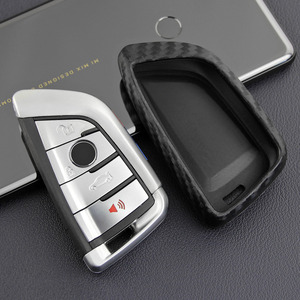 Housse de clé de voiture en silicone à motif fibre de carbone pour <span class=keywords><strong>BMW</strong></span> X5 X6 X4 <span class=keywords><strong>X3</strong></span> Série 1 2 <span class=keywords><strong>Porte</strong></span>-clé à distance - Product Image 1