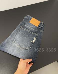 OEM مخصص للرجال جودة عالية ممزق جينز ضيق من المصنع مباشرة فاتح/غامق غسل بالأسى زر نمط صلب لفصل الصيف - Product Image 4