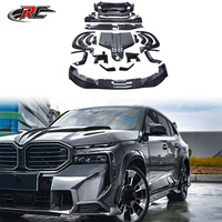 Kit de conversion de voiture style M en fibre de carbone sèche pour BMW XM G09 2022+ : Lame avant, diffuseur arrière, extensions d'ailes et ailerons