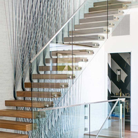 Escalier flottant contemporain avec marches en bois et poutre invisible, escalier droit