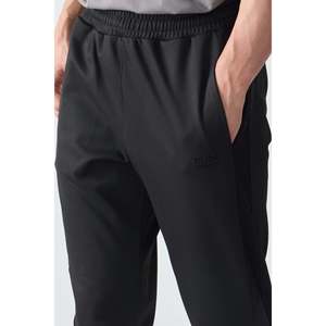 Pantalon de survêtement noir pour homme, taille élastique, coupe standard, tissu respirant décontracté - Product Image 3
