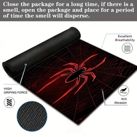 Tapis de souris de jeu extra-large avec un design d'araignée rouge cool - Base en caoutchouc antidérapante, parfait pour les passionnés de jeux.