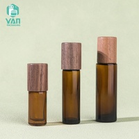 YAN kemasan Mini botol Roll kaca Amber 5ml 10ml 15ml mewah kosong dengan tutup kenari grosir untuk parfum & minyak esensial