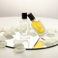 Flacon de parfum vide de 50 ml en verre transparent de forme rectangulaire avec pulvérisateur à pompe, impression de logo personnalisée