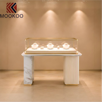 Comptoir de présentation de bijoux en verre incurvé, vitrine de luxe en acier inoxydable pour bijouterie