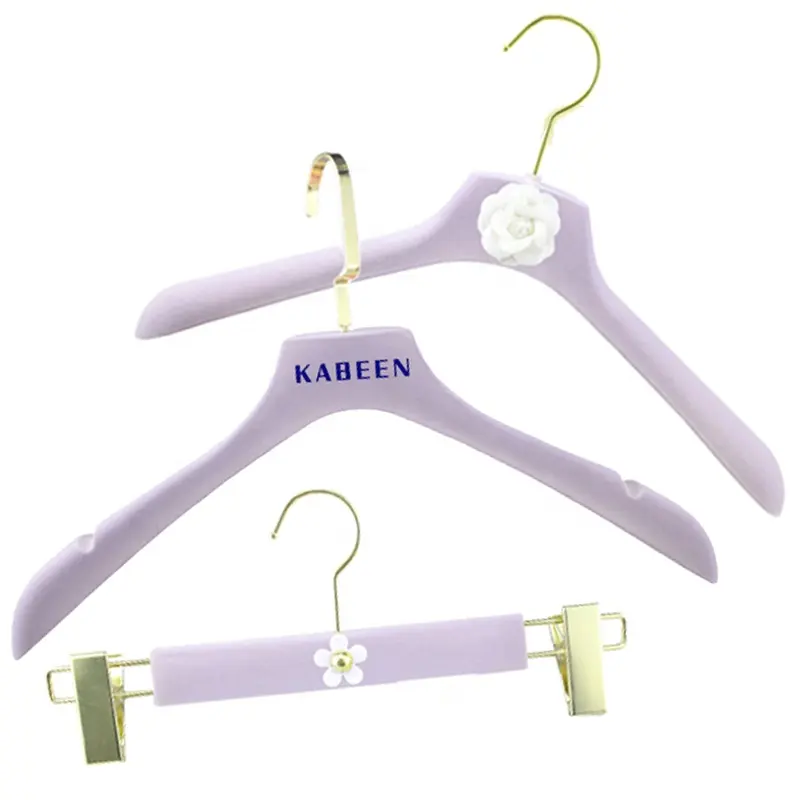 Hot sale luxury swivel metal hook purple flocked coat hanger velvet women dress hangers custom logo brand for fashion store