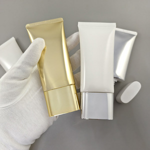 หลอดพลาสติกทรงรีแบนสีทองขนาด 50 มล. สำหรับครีมกันแดด บีบีครีม รองพื้น ครีมเครื่องสำอาง บรรจุภัณฑ์แบบหลอดบีบ พร้อมโลโก้สั่งทำ - Product Image 1