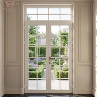 Porte battante élégante en bois massif de style français classique avec grille en verre, isolation thermique, taille personnalisée pour villa et appartement, vie de luxe