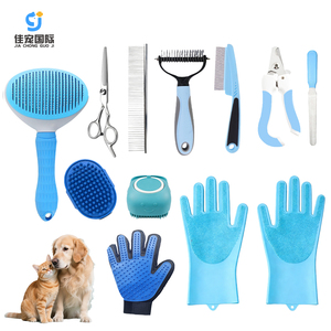 Nuevo Kit de Cepillos Portátiles de Plástico para Aseo de Mascotas 2026 de 11 Piezas con Guante, Peine Autolimpiante, Cepillo de Baño y Cortaúñas para Perros y Gatos - Product Image 1