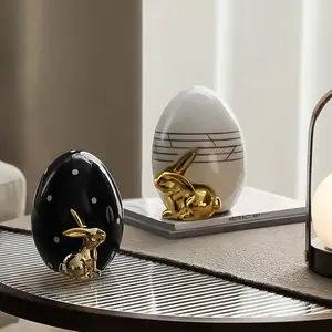 फ्लोलेंको हस्तनिर्मित सुंदर बन्नी लाक्षणिक घर सजावट के अंडे के आकार ईस्टर सजावट सिरेमिक खरगोश मूर्ति