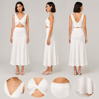 Ensemble deux pièces pour femme : haut court sans manches à col en V avec découpe torsadée et jupe sirène taille haute