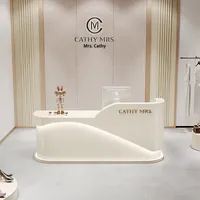 Comptoir de réception de salon de beauté moderne en cuir avec finition laquée, luxe léger, haut de gamme