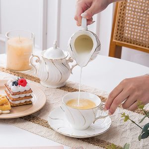 ชุดถ้วยชาและจานรองเซรามิก แก้วกาแฟ 6 ออนซ์ สำหรับกาแฟ ลาเต้ คาเฟ่ มอคค่า และชุดน้ำชา 4 ชิ้น สีขาว - Product Image 2