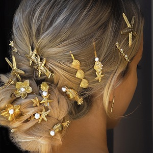 Nouvelles pinces à cheveux en alliage plaqué or 18 carats avec coquille de perle et étoile de mer, accessoires de cheveux de plage adaptés aux filles - Product Image 2