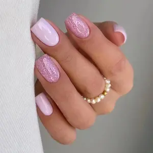Mid length pink white girl nail polish glittering pink sequins fake nails rubber pink white solid color wearing nail patches