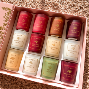 Aikun – Coffret cadeau de 12 mini bougies parfumées multicolores à une seule mèche dans des pots en verre, avec boîte à compartiments pour offrir - Product Image 1