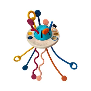 Bebek komik çektirme duyusal çekme dize oyuncak itme Pop silikon halat çocuklar eğitim Montessori UFO çekme dize oyuncak bebek 18M + için