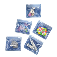 Sac refermable en PVC aseptique de luxe élégant avec fermeture éclair métallique holographique pour bijoux, bracelets, lunettes, bagues, boucles d'oreilles, colliers, pierres précieuses