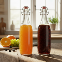 Bouteilles en verre transparentes de qualité supérieure de 250 ml, 500 ml, 750 ml, 1000 ml avec bouchon à bascule pour la fabrication de boissons à domicile, la vinification, la vente en gros aux usines