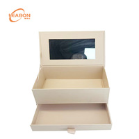 Boîte en papier rigide magnétique portable, écologique et luxueuse, avec fenêtre transparente en PVC, laminage mat, logo personnalisé, pour parfums et cosmétiques