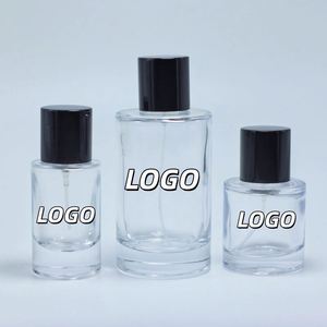Flacons de parfum ronds en verre transparent de 30 ml, 50 ml, 100 ml avec impression de logo personnalisée et emballage en boîte - Product Image 1