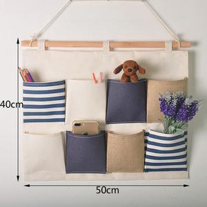Organizador de Almacenamiento Colgante Ecológico con 5 Bolsillos y Bolsillo de Rejilla para Ropa y Juguetes - Product Image 1