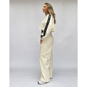 เสื้อสเวตเตอร์สีครีมเสื้อจั๊มเปอร์ใส่อยู่บ้านโลโก้ทรงถั่ว - Product Image 1