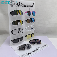 Présentoir à lunettes modulaire multi-emplacements rotatif à 3 niveaux en acrylique pour la vente au détail, fabriqué au Vietnam par DSP