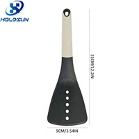 Spatule à fentes en nylon plastique rigide de haute qualité, résistante à la chaleur, légère, pour la maison, avec manche en caoutchouc confortable