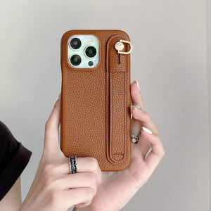 เคสโทรศัพท์หนังเทียมสำหรับไอโฟน พร้อมขาตั้งแบบเส้นและสายคล้องโทรศัพท์ ดีไซน์สีพื้น - Product Image 3