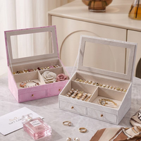 Boîte de rangement à bijoux double couche en cuir PU de style européen et américain de luxe avec fermeture magnétique et fenêtre visible pour colliers et bagues